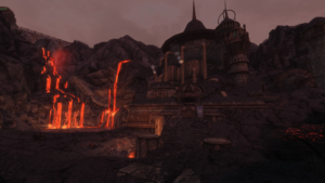 A screenshot of a delapidated Dwemer ruin in a steep gorge, surrounded by running lava